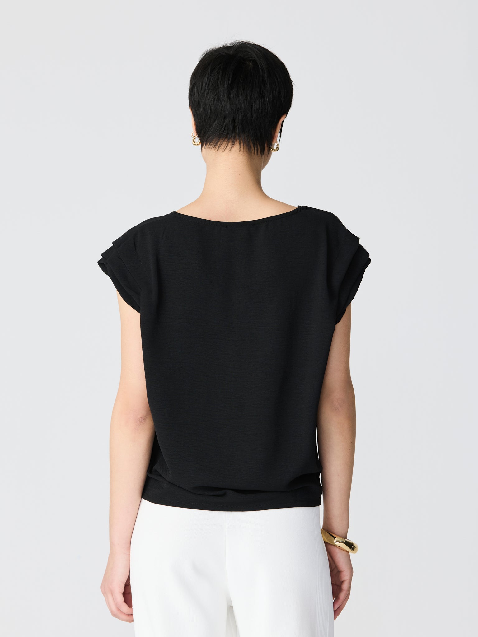 Blouse with golden details V-neck