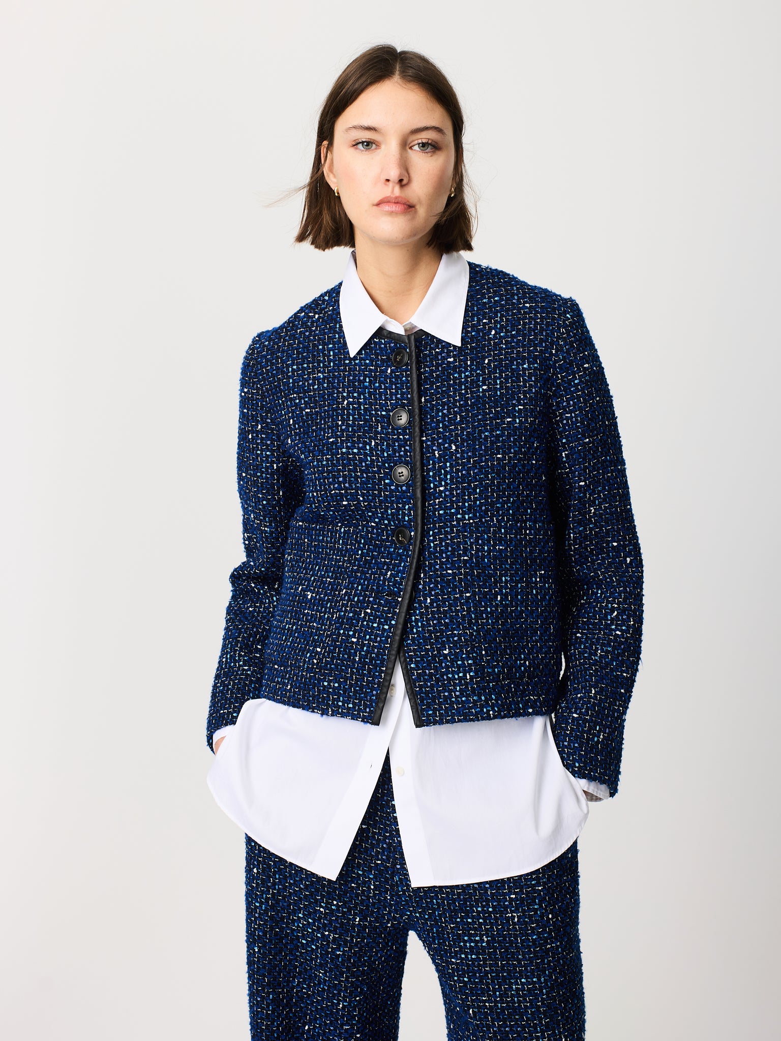 Jaqueta chanel amb rivet de polipell